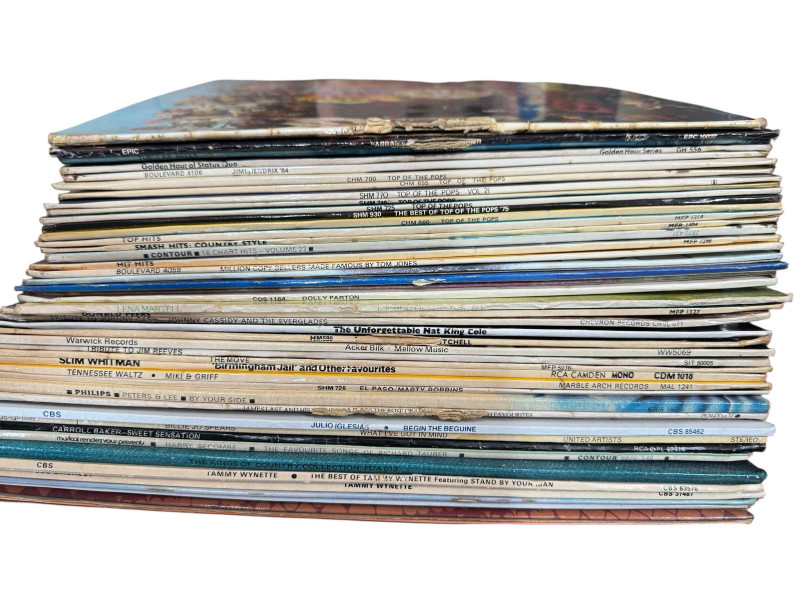 Collection of LP and single records including Beatles Sgt Pepper.