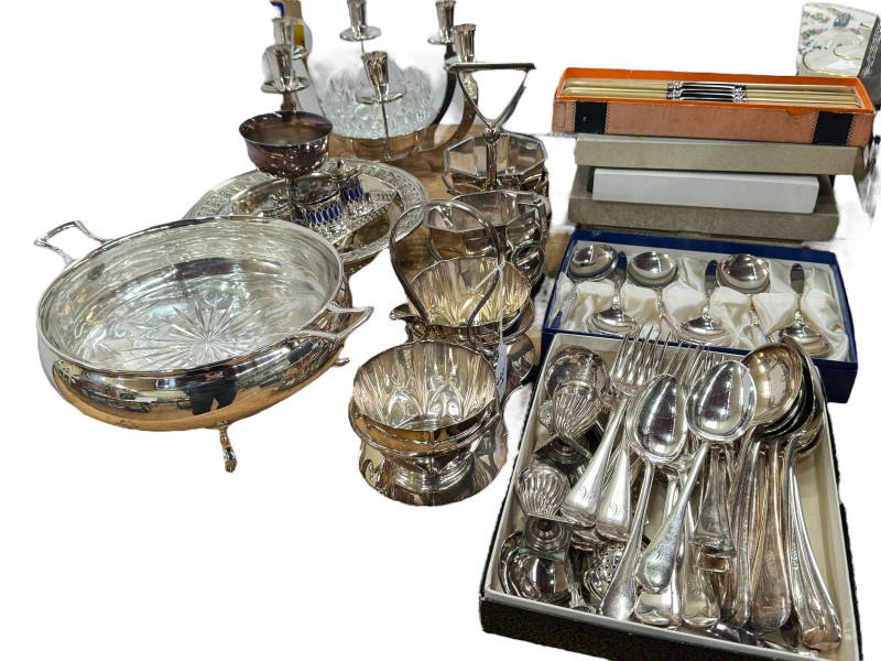 Collection of silver plated wares including six branch candle holder, cutlery, serving bowl, etc.