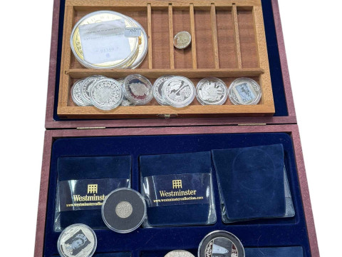 Four models by Denzil Skinner & Co Ltd, commemorative crowns, capsulated...