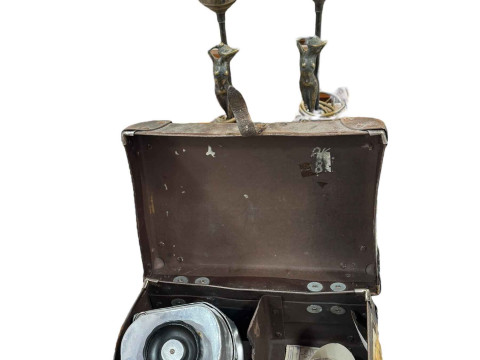 Two retro lady figural table lamps and a bus conductors machine.