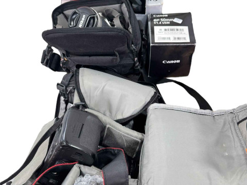 Nikon F75 camera with 28-100 lense, EO5 7D with Sigma DC17/70 lense and...