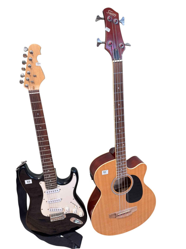 Swift electric bass guitar and an electric guitar.