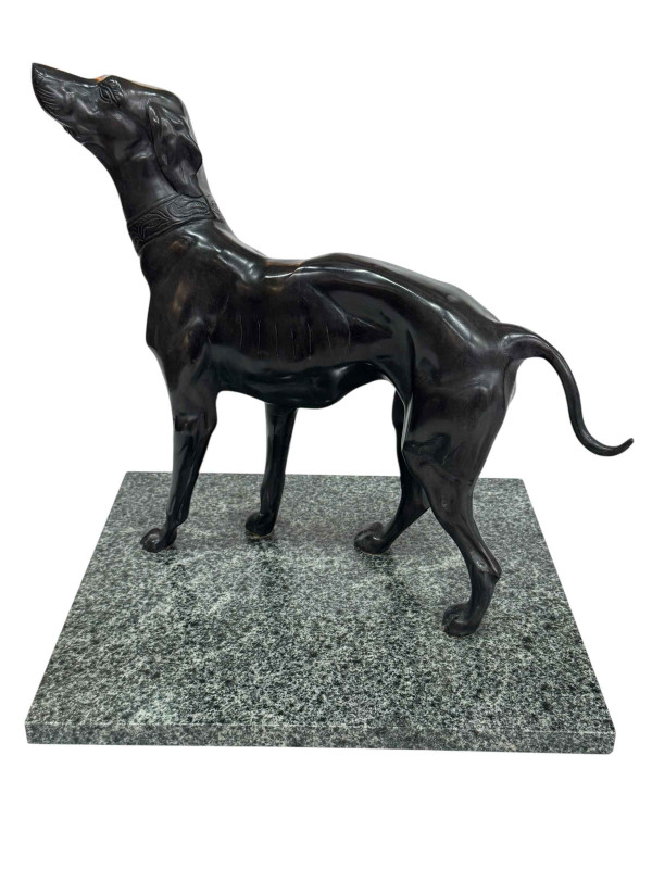 Bronzed Whippet dog on marble plinth.