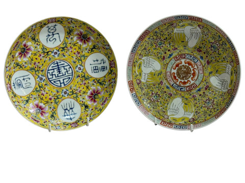 Two Chinese yellow ground saucer dishes, iron red character and seal marks,...