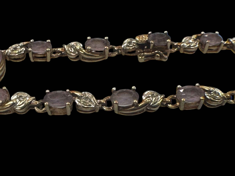 9 carat gold, amethyst and diamond bracelet.