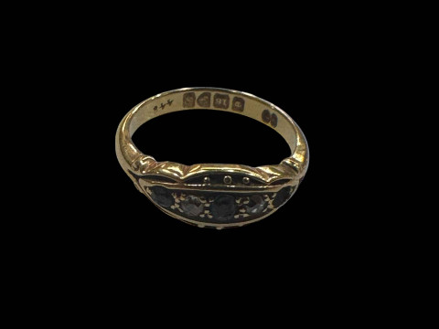 Sapphire and diamond 18 carat gold ring, size M, Chester 1915.