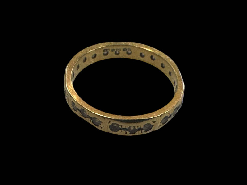 18 carat gold diamond set eternity ring.