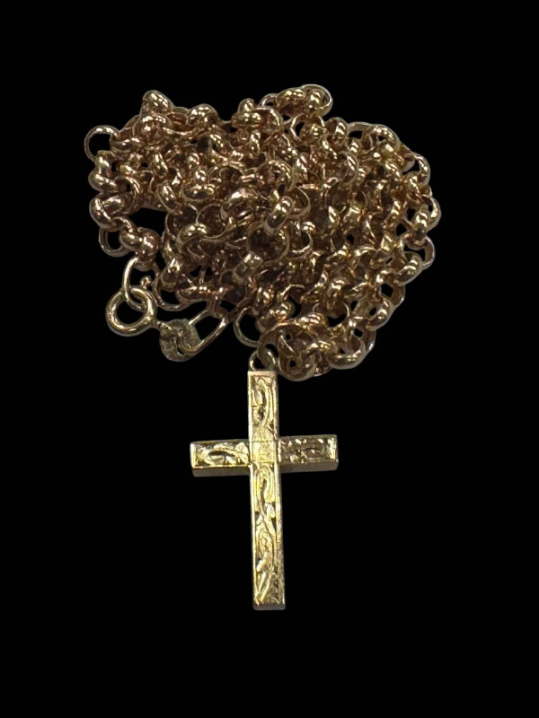 9 carat gold cross pendant with chain.