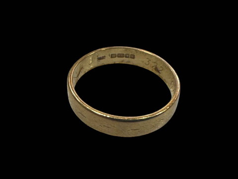 18 carat gold wedding band.