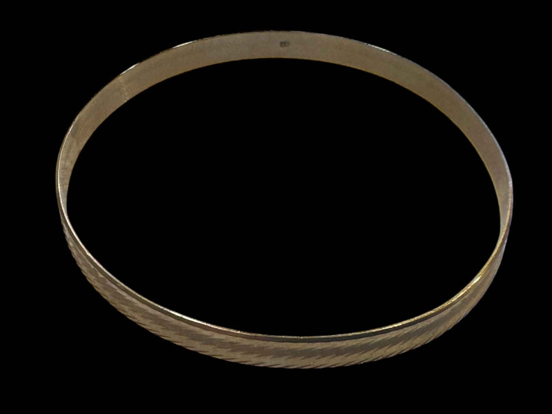 Gold and silver bangle, stamped 333.