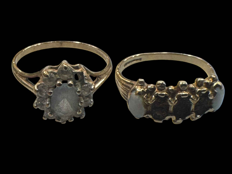 Two 9 carat gold gem set rings, some stones missing.