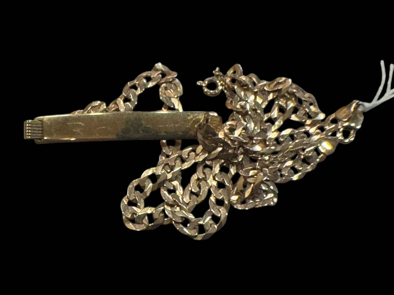 9 carat gold identity necklace.