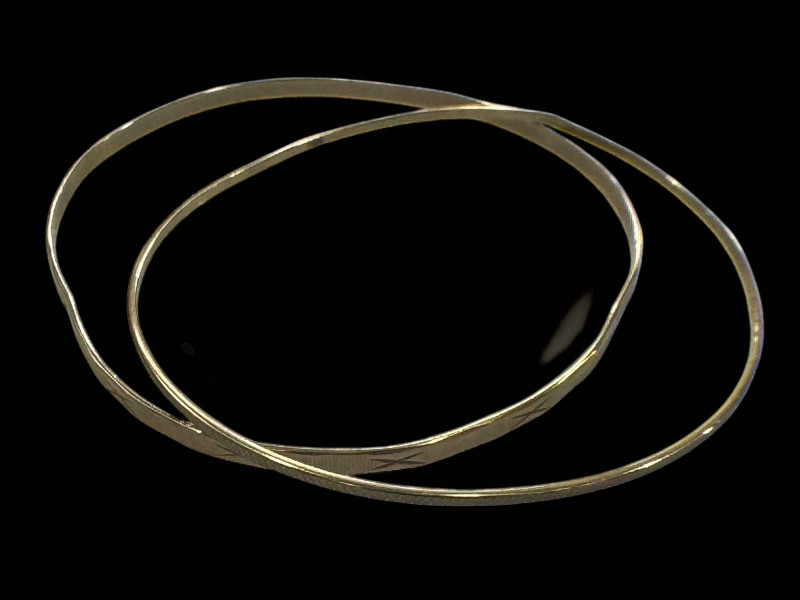 Two gold and silver bangles, stamped 333.