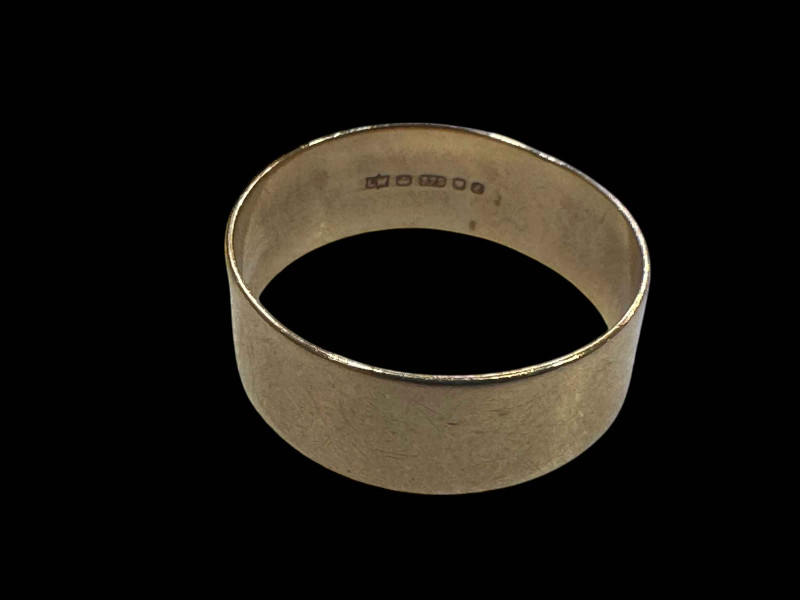 9 carat gold wedding band.