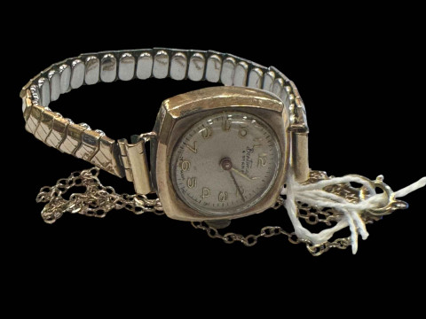 Ladies 9 carat gold watch and two chain remnants.