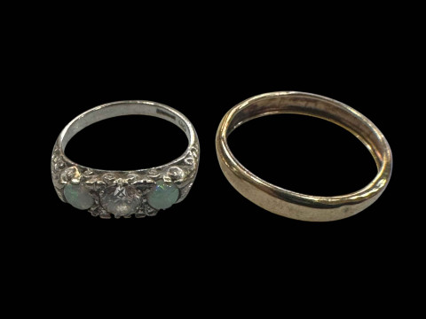 Opal and diamond 18 carat white gold ring, size M, and unmarked band ring...
