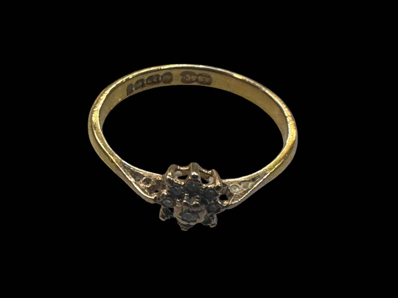 Diamond set 22 carat gold ring (one stone missing).