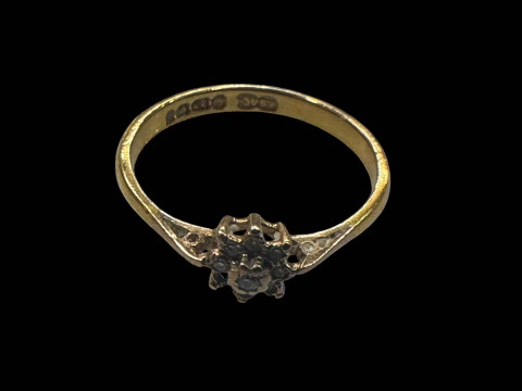 Diamond set 22 carat gold ring (one stone missing).