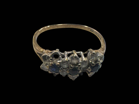 9 carat gold gem set ring, stones missing.