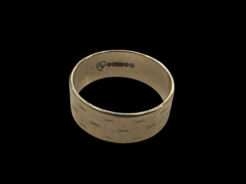 9 carat gold wedding band.