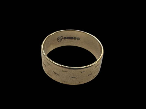 9 carat gold wedding band.