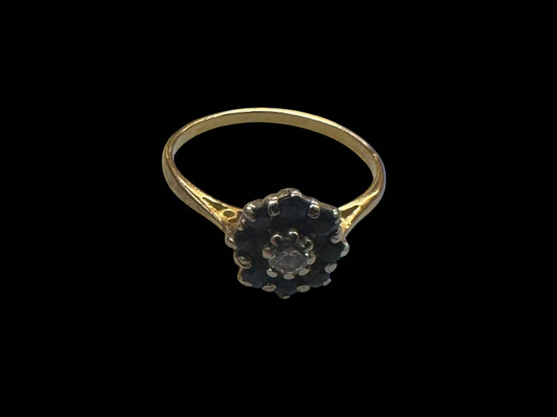 Sapphire and diamond cluster 18 carat gold ring, size Q.