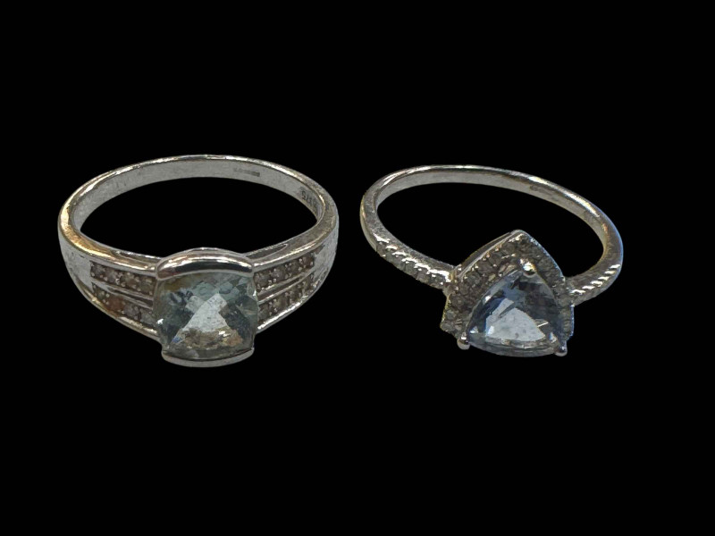 Two 9 carat white gold gem set rings.