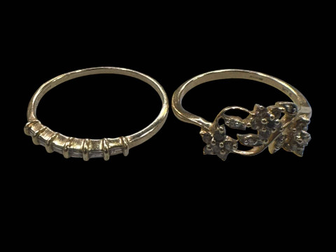 Two 9 carat gold gem set rings.