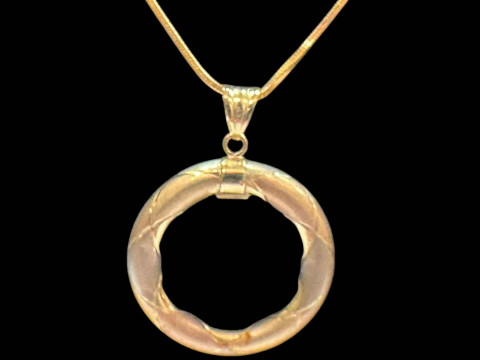 9k gold circle pendant and chain.