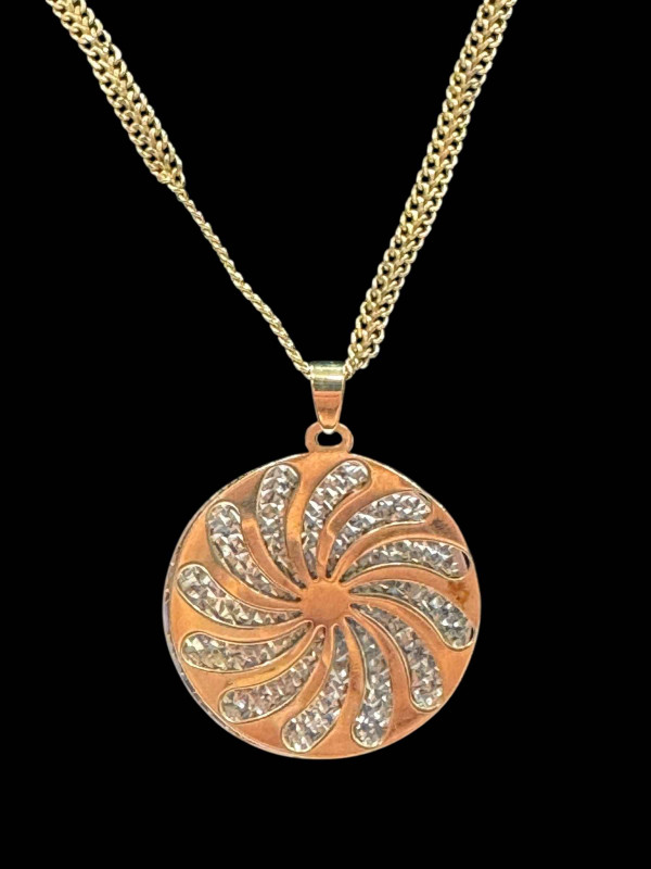 9 carat gold mesh link chain with two dish (one white?) pendulum.