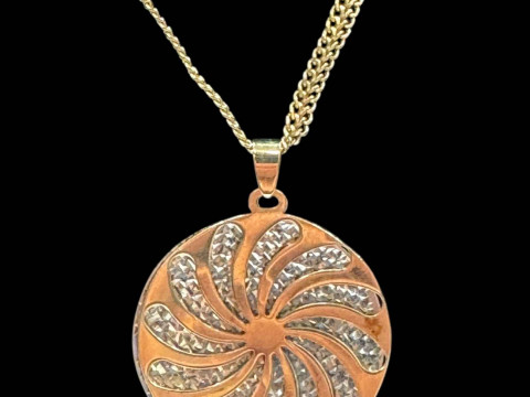 9 carat gold mesh link chain with two dish (one white?) pendulum.