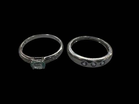 Two 9 carat white gold gem set rings.