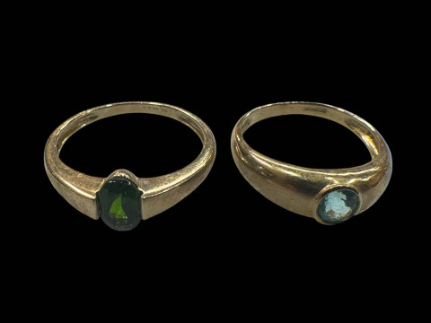 Two 9 carat gold gem set rings.