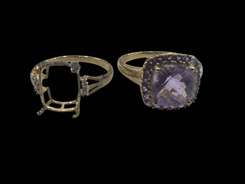 Two 9 carat gold gem set rings, one with stone missing.