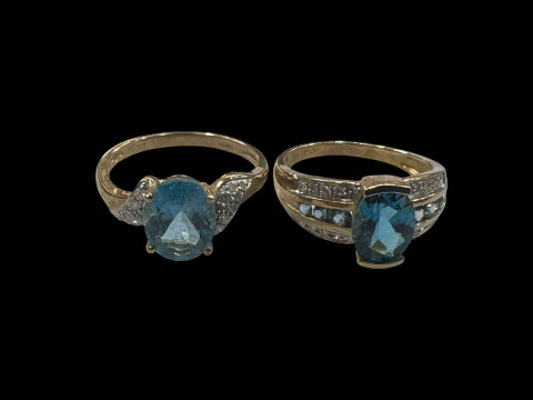Two 9 carat gold gem set rings.