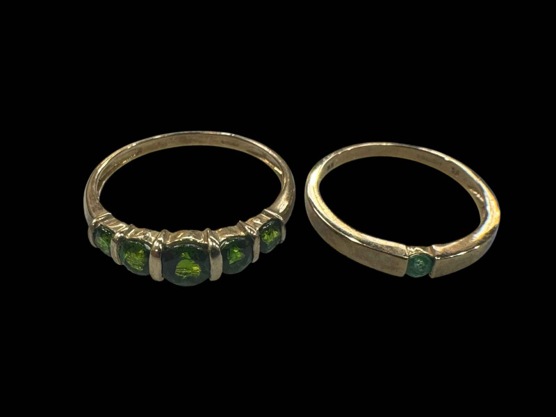 Two 9 carat gold gem set rings.