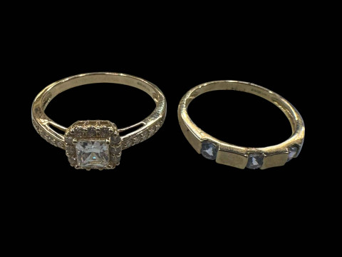 Two 9 carat gold gem set rings.