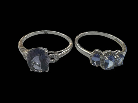 Two 9 cat white gold gem set rings.
