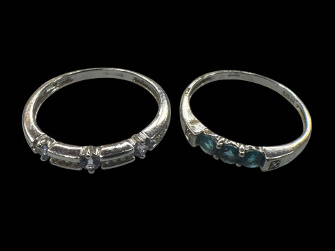 Two 9 carat white gold gem set rings.