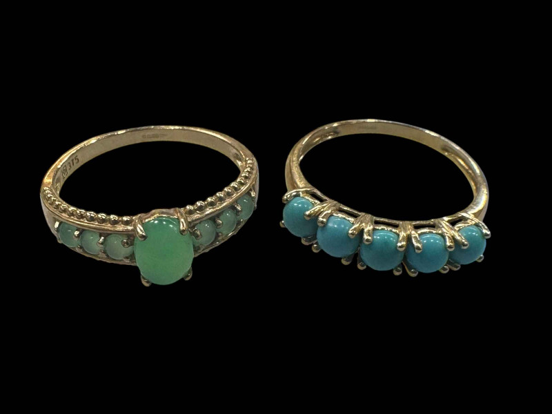 Two 9 carat gold gem set rings.