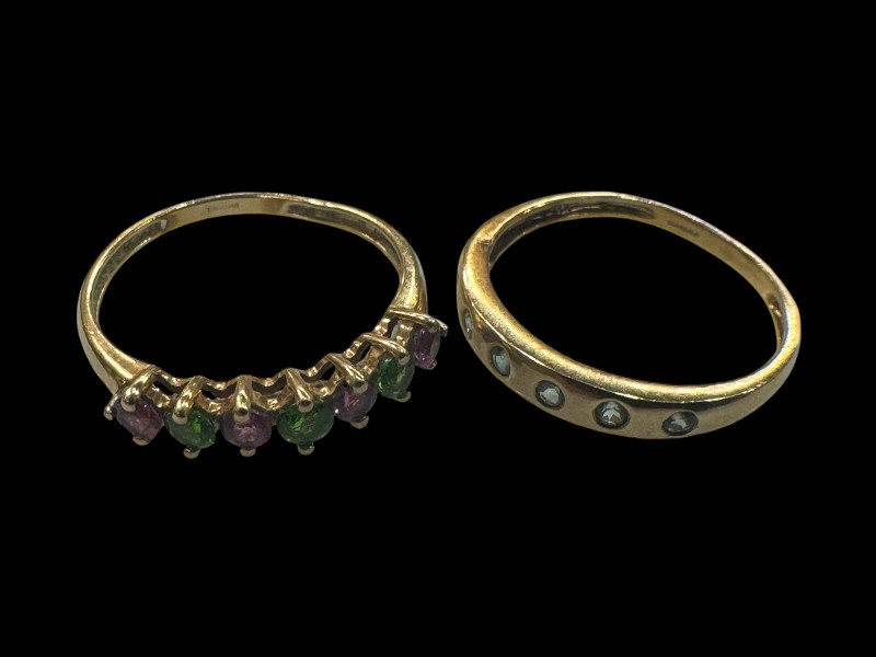 Two 9 carat gold gem set rings.