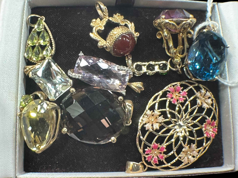 Collection of eight 9 carat gold gem set pendants, and two fobs (10).