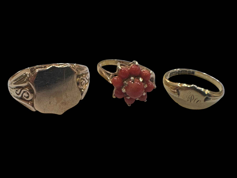 Two 9 carat gold signet rings and 9 carat gold and coral set ring (3).
