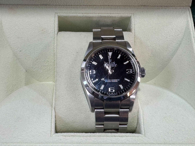 Rolex Explorer Oyster Perpetual, 114270, in stainless steel, 36mm case, 2009, with Goldsmiths receipt, papers and box.