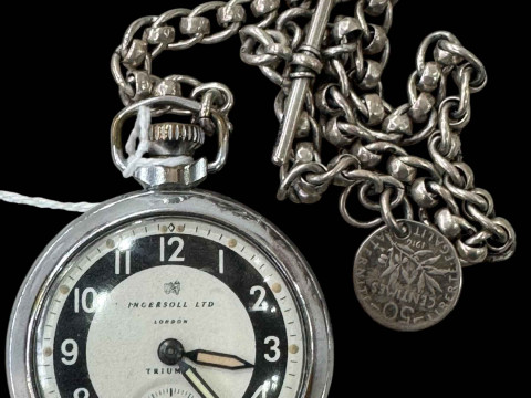 Ingersoll Triumph pocket watch with silver albert.