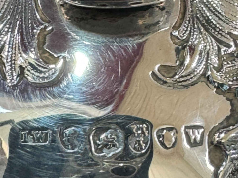 William IV silver four piece tea and coffee set having embossed decoration and on scroll feet, John Walton, Newcastle, 1835. thumbnail