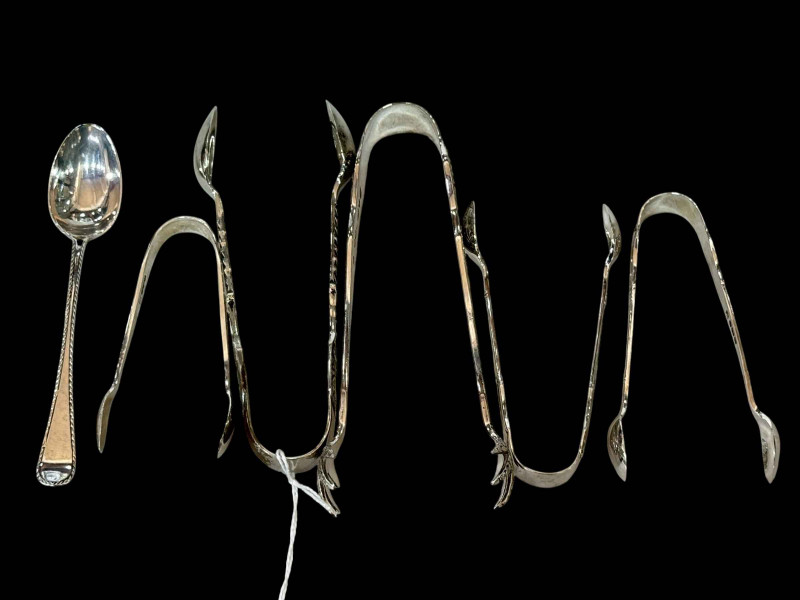 Collection of five pairs of silver tongs and single teaspoon.