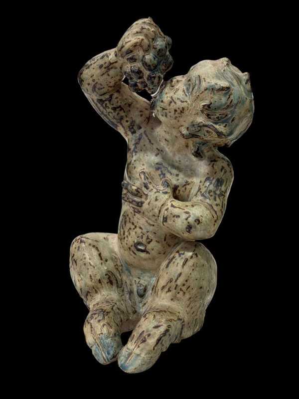 Large Knud Kyhn Royal Copenhagen sitting faun, 33cm.