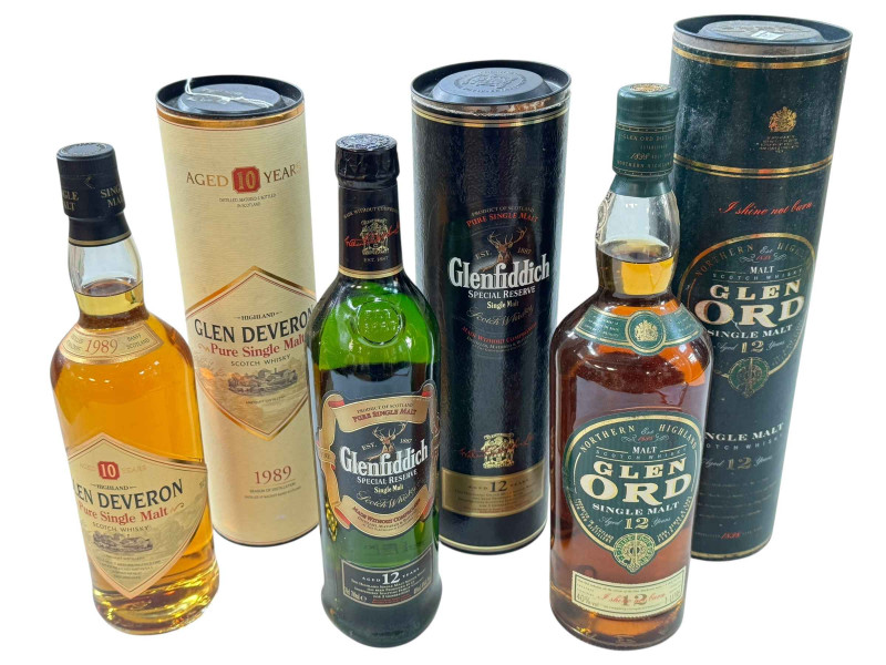 Three bottles of Whisky, Glen Ord, Glen Deveron and Glenfiddich single malts.