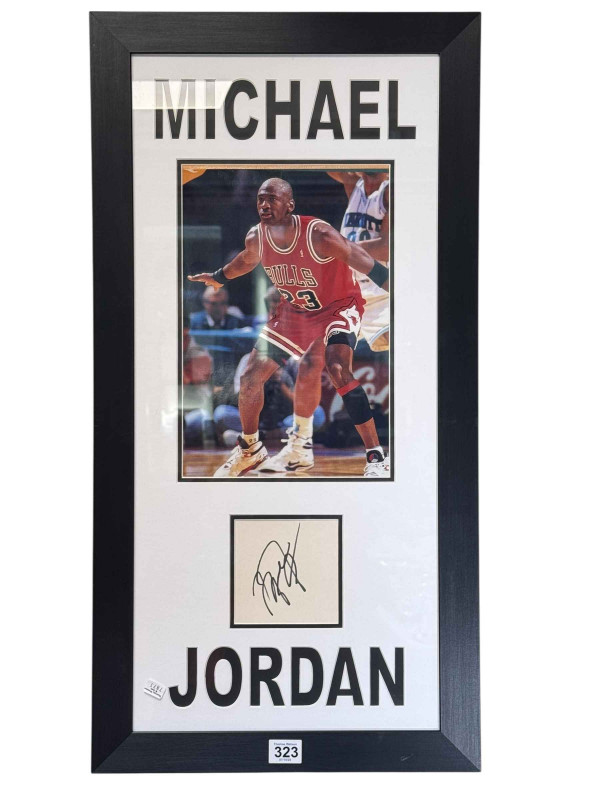 Michael Jordan, framed autograph and photographical print with COA, 72cm by 37cm, including frame.